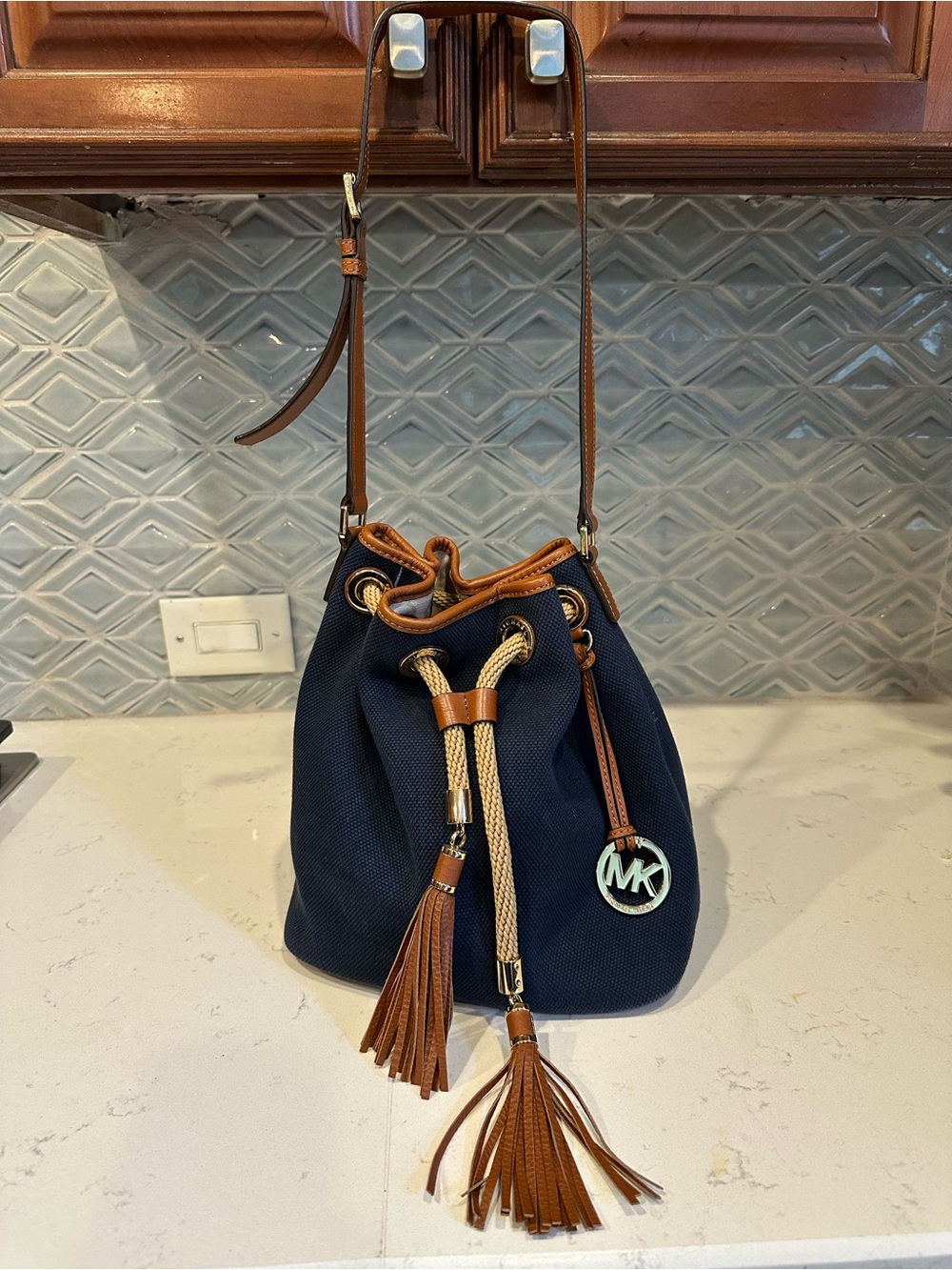 Michael Kors Marina Navy Canvas Drawstring Bucket Bag with Brown Trim